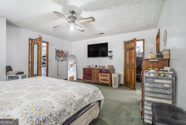 2969 White Rd NE, Conyers, GA 30012 - carpeted bedroom with a textured ceiling and ceiling fan
