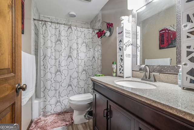 2969 White Rd NE, Conyers, GA 30012 - full bathroom featuring vanity and shower / bath combo with shower curtain