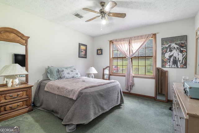 2969 White Rd NE, Conyers, GA 30012 - bedroom with carpet, a ceiling fan, and a textured ceiling