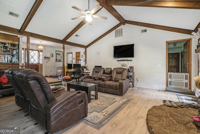 2969 White Rd NE, Conyers, GA 30012 - living room with ceiling fan, light wood-type flooring, beamed ceiling, and high vaulted ceiling
