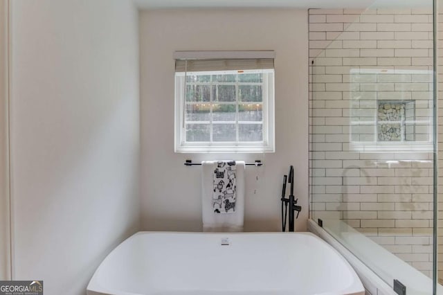 7653 Legacy Rd, Flowery Branch, GA 30542 - full bath featuring a freestanding bath