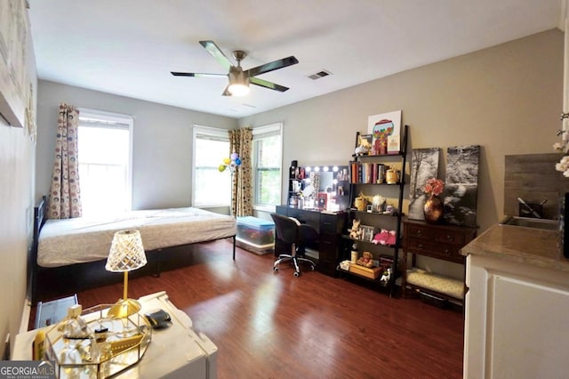 5996 Eagle Tiff Ln, Sugar Hill, GA 30518 - bedroom featuring wood finished floors, a desk, and ceiling fan