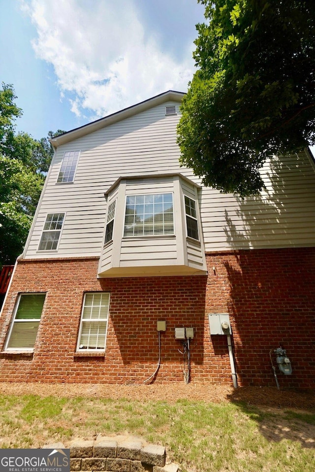 5996 Eagle Tiff Ln, Sugar Hill, GA 30518 - back of house featuring brick siding