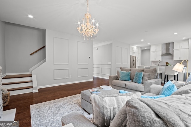 149 Archie Way, Woodstock, GA 30188 - living room featuring a chandelier, stairway, recessed lighting, dark wood finished floors, and washer / clothes dryer