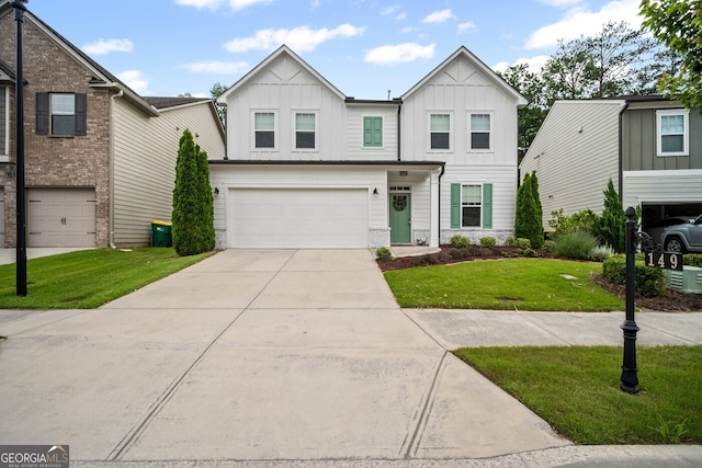 149 Archie Way, Woodstock, GA 30188 - view of front of property with board and batten siding, a garage, concrete driveway, a front yard, and stone siding