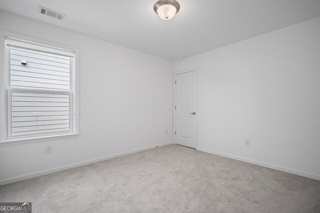 149 Archie Way, Woodstock, GA 30188 - unfurnished room with carpet floors and baseboards