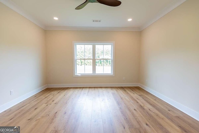 408 Mock St, Sylvania, GA 30467 - empty room with crown molding, light wood-type flooring, baseboards, ceiling fan, and recessed lighting