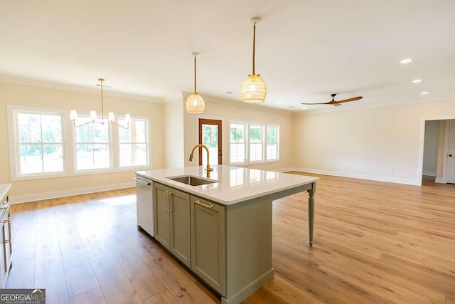 408 Mock St, Sylvania, GA 30467 - kitchen with a sink, gray cabinetry, crown molding, open floor plan, and stainless steel dishwasher