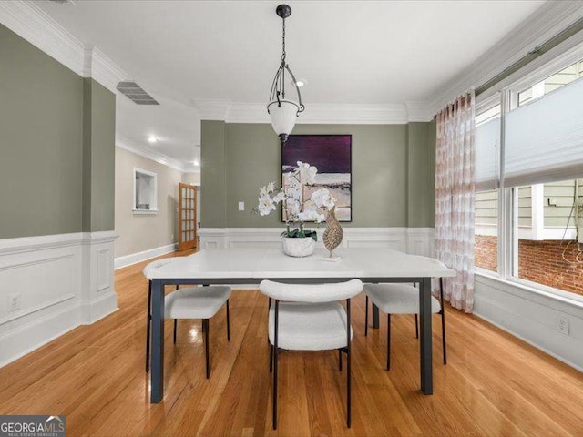 121 Fulton Way SE, Atlanta, GA 30312 - dining space with crown molding, wainscoting, plenty of natural light, light wood finished floors, and recessed lighting
