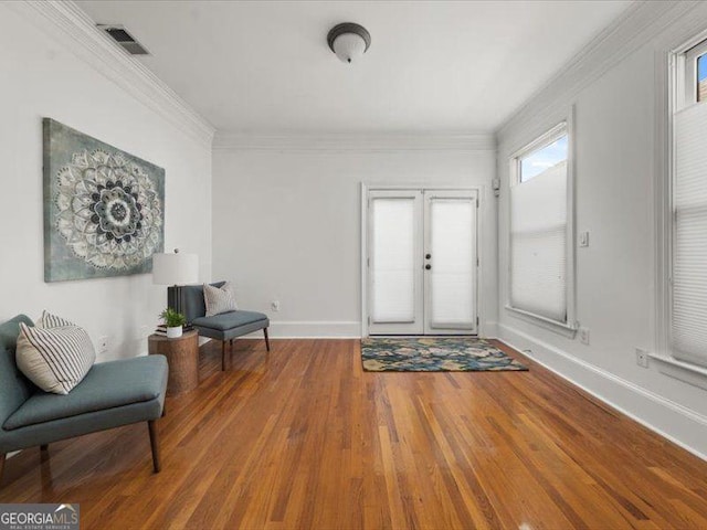 121 Fulton Way SE, Atlanta, GA 30312 - entrance foyer with wood finished floors, ornamental molding, baseboards, and french doors