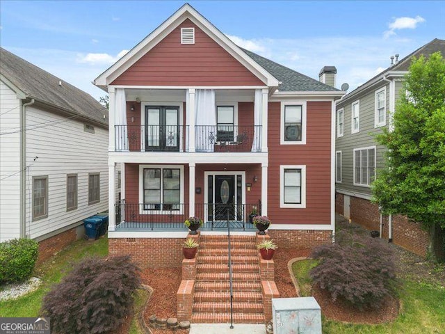 121 Fulton Way SE, Atlanta, GA 30312 - view of front facade with a balcony, a porch, and french doors