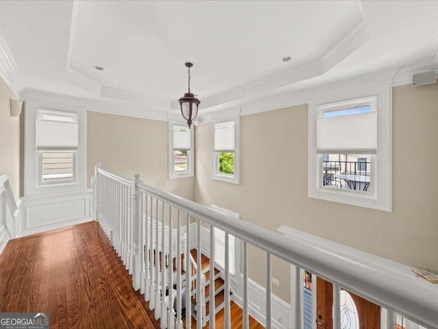121 Fulton Way SE, Atlanta, GA 30312 - corridor featuring a raised ceiling, crown molding, wood finished floors, and an upstairs landing