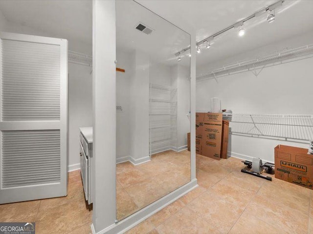 121 Fulton Way SE, Atlanta, GA 30312 - walk in closet with tile patterned flooring