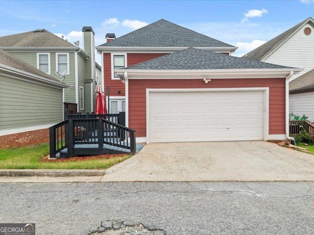 121 Fulton Way SE, Atlanta, GA 30312 - traditional-style home with driveway, a shingled roof, and a garage