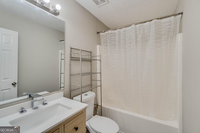 236 Fairview Dr, Dallas, GA 30157 - full bathroom with vanity, toilet, shower / tub combo, and a textured ceiling