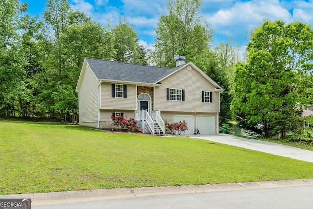236 Fairview Dr, Dallas, GA 30157 - split foyer home with an attached garage, a chimney, driveway, a front lawn, and a shingled roof