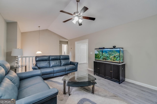 236 Fairview Dr, Dallas, GA 30157 - living area with light wood finished floors, ceiling fan, vaulted ceiling, and baseboards