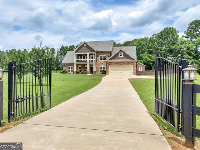 3905 Pointer Rd, Loganville, GA 30052 - view of front facade featuring a gate, brick siding, and driveway