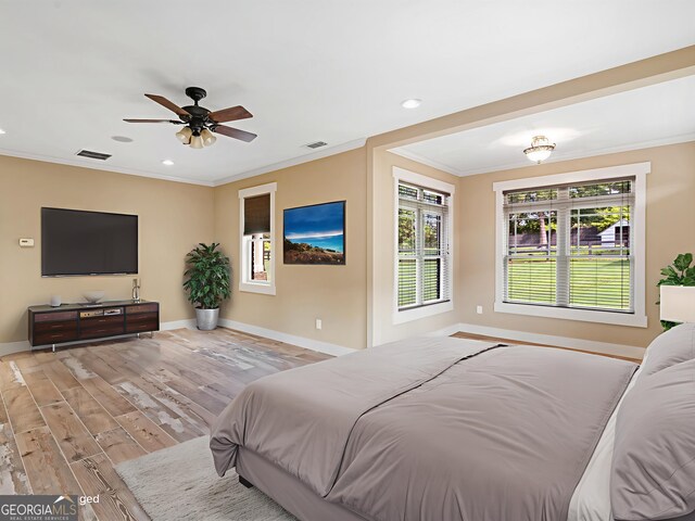 3905 Pointer Rd, Loganville, GA 30052 - bedroom with ornamental molding, wood finished floors, recessed lighting, and a ceiling fan