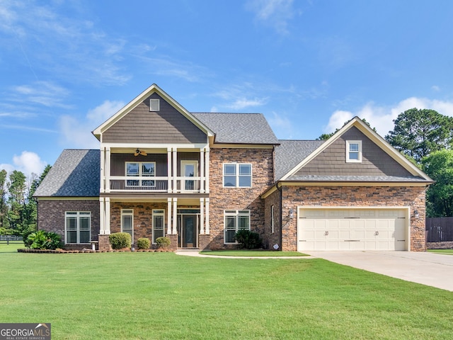 3905 Pointer Rd, Loganville, GA 30052 - craftsman-style home featuring a balcony, a front yard, driveway, ceiling fan, and stone siding