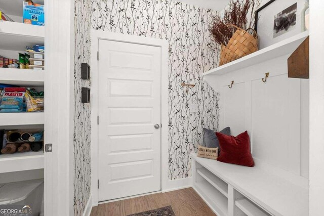 8415 Azure Overlook Trl, Gainesville, GA 30506 - mudroom with wallpapered walls and wood finished floors
