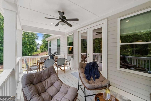 8415 Azure Overlook Trl, Gainesville, GA 30506 - wooden deck featuring outdoor dining space and ceiling fan