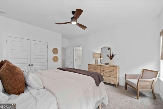 8415 Azure Overlook Trl, Gainesville, GA 30506 - bedroom with a closet, light colored carpet, ceiling fan, and baseboards