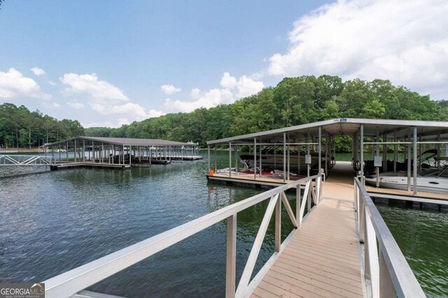 8415 Azure Overlook Trl, Gainesville, GA 30506 - dock area featuring a water view and a view of trees