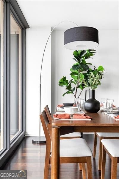 620 Peachtree St NE Unit 1206, Atlanta, GA 30308 - dining room featuring dark wood-style flooring