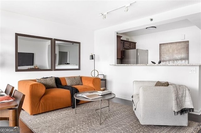 620 Peachtree St NE Unit 1206, Atlanta, GA 30308 - living area with wood finished floors and track lighting