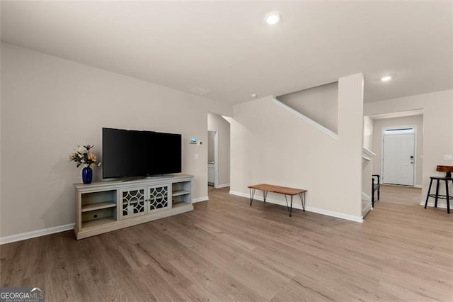 352 Walnut Grove Way, Pendergrass, GA 30567 - living area with stairs, wood finished floors, baseboards, and recessed lighting