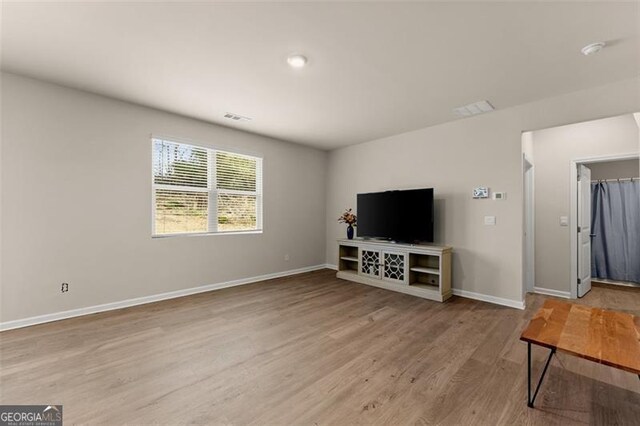 352 Walnut Grove Way, Pendergrass, GA 30567 - living room with wood finished floors and baseboards