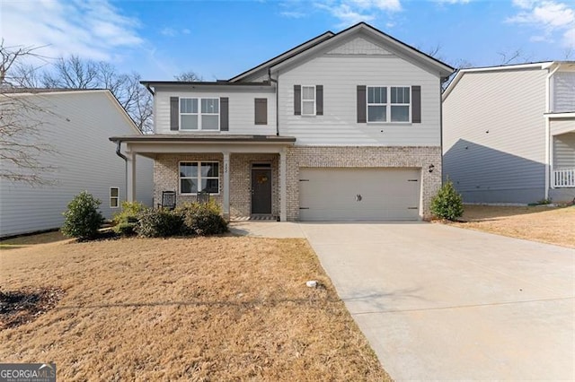 352 Walnut Grove Way, Pendergrass, GA 30567 - view of front of house with brick siding, an attached garage, concrete driveway, and covered porch