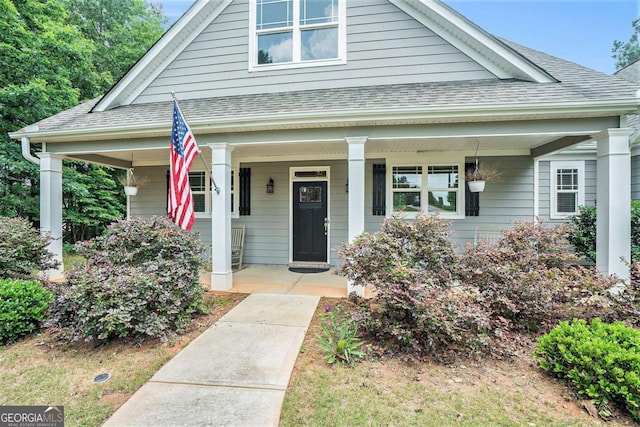 2569 Jones Pine Rd, Good Hope, GA 30641 - bungalow-style house featuring covered porch and roof with shingles