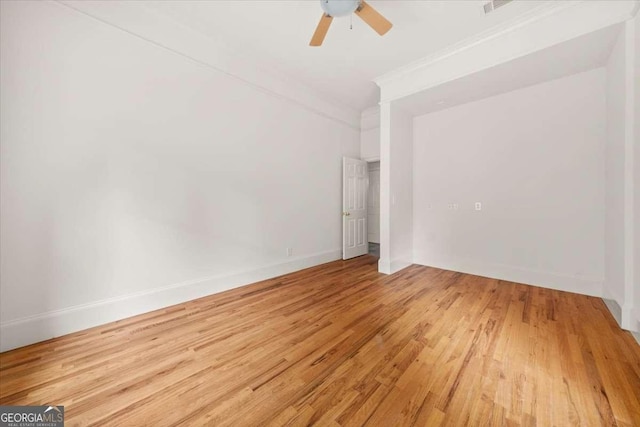 6771 Sunny Brook Ln, Atlanta, GA 30328 - empty room with light wood-style floors, ornamental molding, and ceiling fan