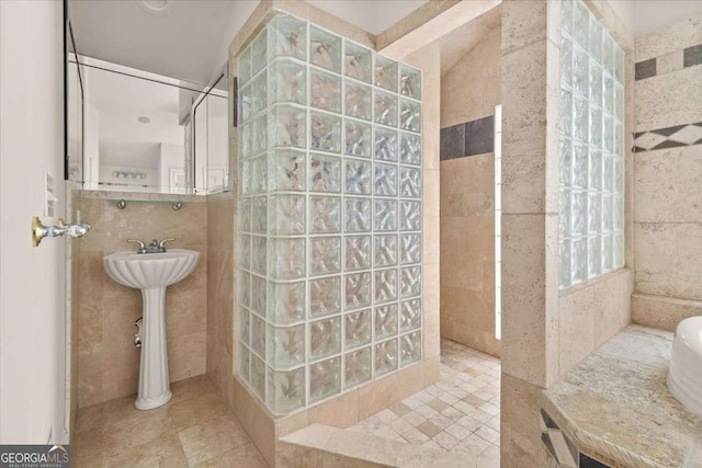 6771 Sunny Brook Ln, Atlanta, GA 30328 - full bathroom with walk in shower, tile walls, and tile patterned flooring
