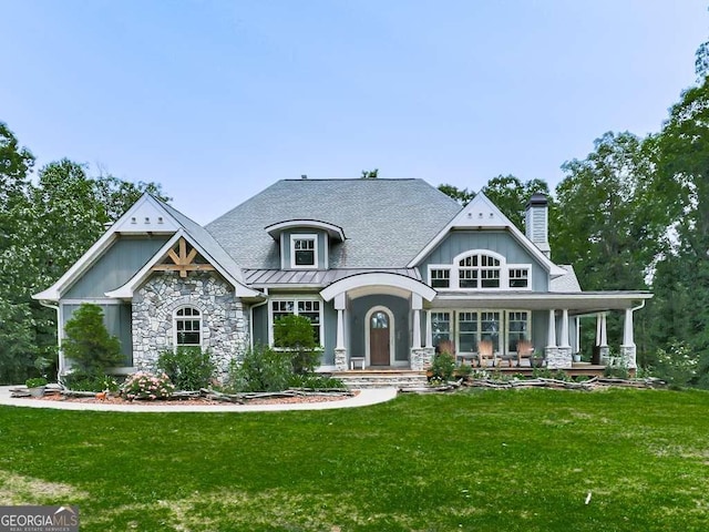 4454 Damascus Rd, Jasper, GA 30143 - craftsman-style home featuring a front yard, a chimney, stone siding, and a standing seam roof