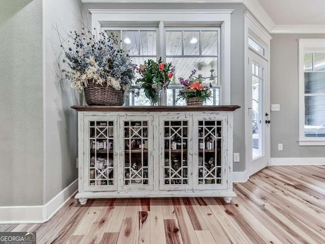 4454 Damascus Rd, Jasper, GA 30143 - bar with wood finished floors, baseboards, and ornamental molding