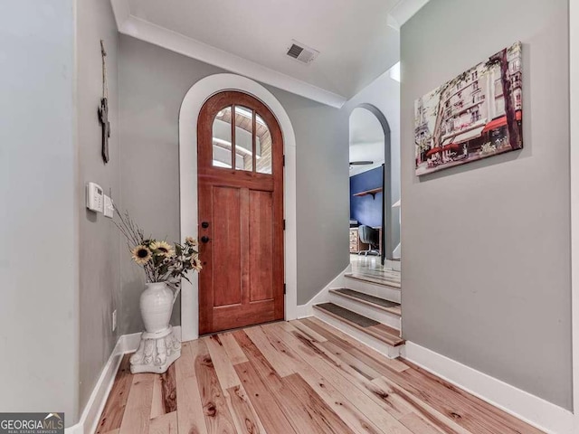 4454 Damascus Rd, Jasper, GA 30143 - entryway with arched walkways, light wood-type flooring, and baseboards