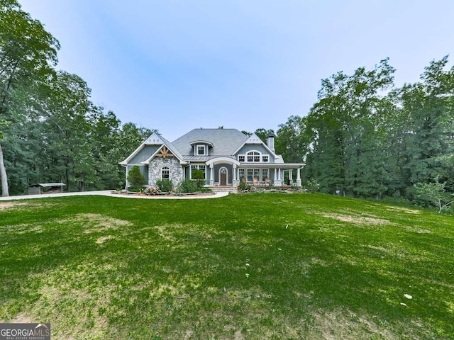 4454 Damascus Rd, Jasper, GA 30143 - view of front facade with a chimney, a front yard, stone siding, and a porch