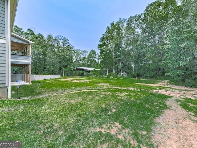 4454 Damascus Rd, Jasper, GA 30143 - view of green lawn featuring a carport
