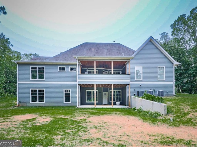 4454 Damascus Rd, Jasper, GA 30143 - back of house featuring a patio area, a yard, a sunroom, and central AC unit