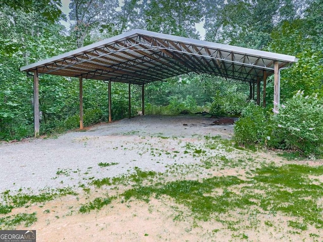 4454 Damascus Rd, Jasper, GA 30143 - view of parking / parking lot with a carport, driveway, and view of scattered trees