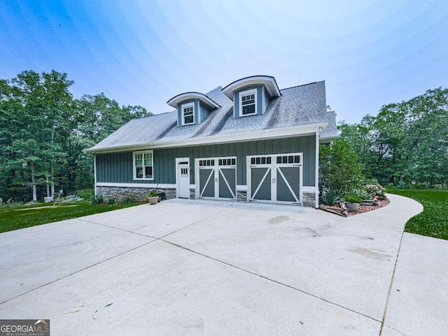 4454 Damascus Rd, Jasper, GA 30143 - view of front of house featuring board and batten siding, stone siding, and driveway