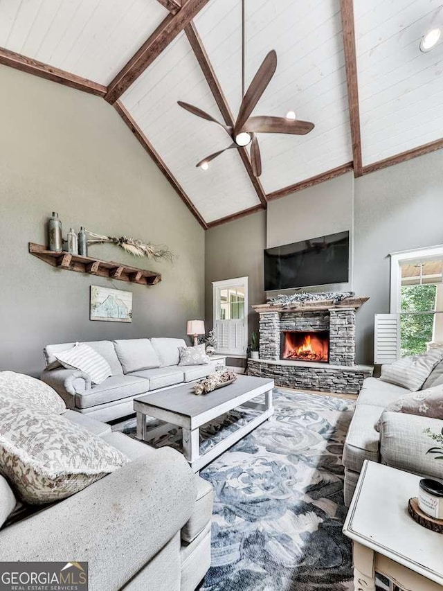 4454 Damascus Rd, Jasper, GA 30143 - living room with high vaulted ceiling, a stone fireplace, ceiling fan, and wooden ceiling with exposed beams