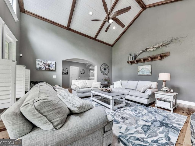 4454 Damascus Rd, Jasper, GA 30143 - living area with wood finished floors, arched walkways, a ceiling fan, high vaulted ceiling, and recessed lighting