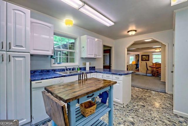 4618 Jones Gap Rd, Hiawassee, GA 30546 - kitchen with dishwasher, butcher block countertops, a sink, white cabinetry, and a peninsula