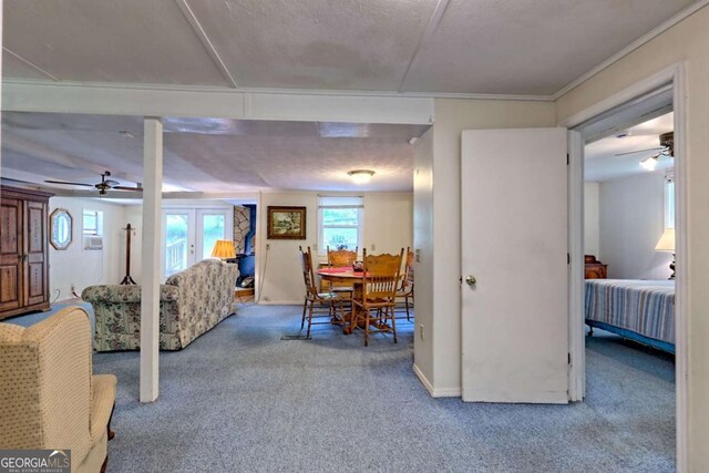 4618 Jones Gap Rd, Hiawassee, GA 30546 - dining room featuring a ceiling fan, carpet floors, and ornamental molding