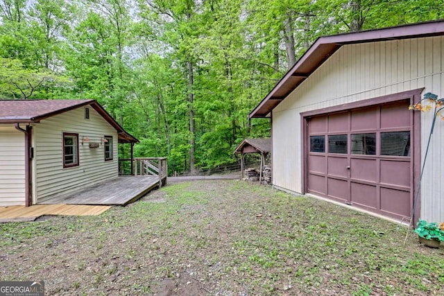 4618 Jones Gap Rd, Hiawassee, GA 30546 - view of yard with a wooden deck, an outbuilding, and a view of trees