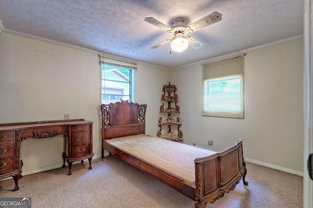 4618 Jones Gap Rd, Hiawassee, GA 30546 - bedroom featuring a textured ceiling, carpet flooring, baseboards, a ceiling fan, and crown molding